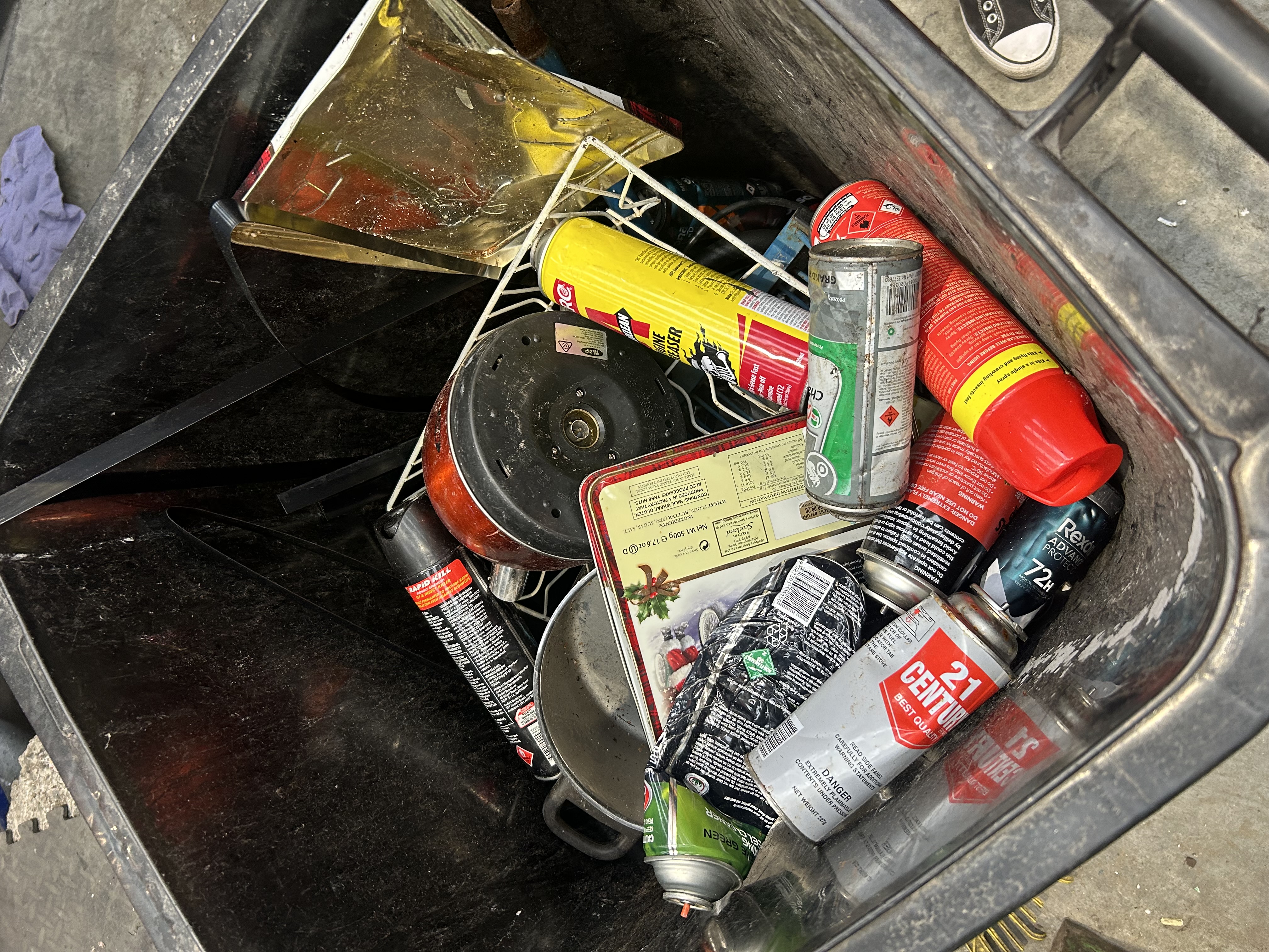 Aerosol cans along with other metal rubbish found in yellow recycling bins over the last week.  